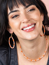Load image into Gallery viewer, Pink and Orange Glass Bead Hoop Dangle Earrings